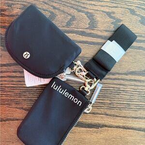 Lululemon Black Dual Pouch Wristlet with Gold Accents